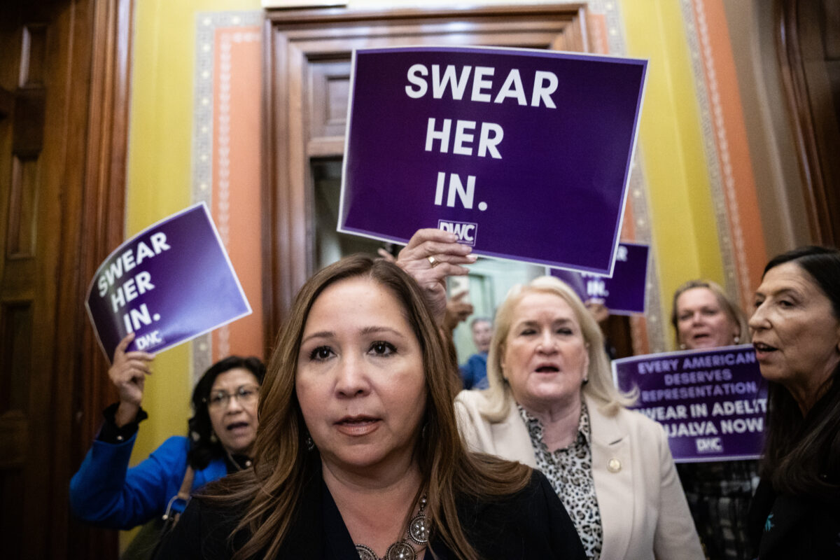 Representative-elect Adelita Grijalva (D-Ariz.) and other Democrats protest the delay in swearing her into the House