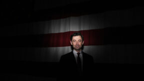 Sen. Jon Ossoff, D-Ga., in front of American flag