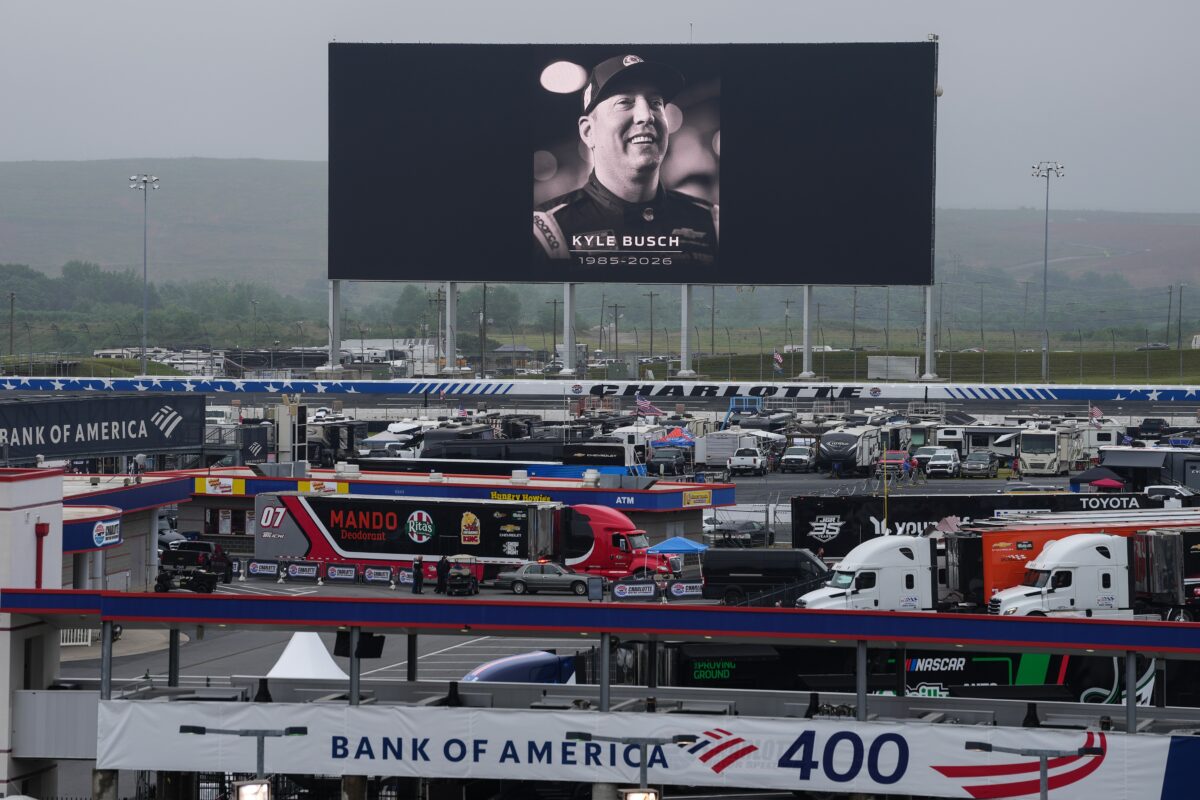 An in memoriam photo of former driver Kyle Busch is displayed on the video board of the backstretch at Charlotte Motor Speedway