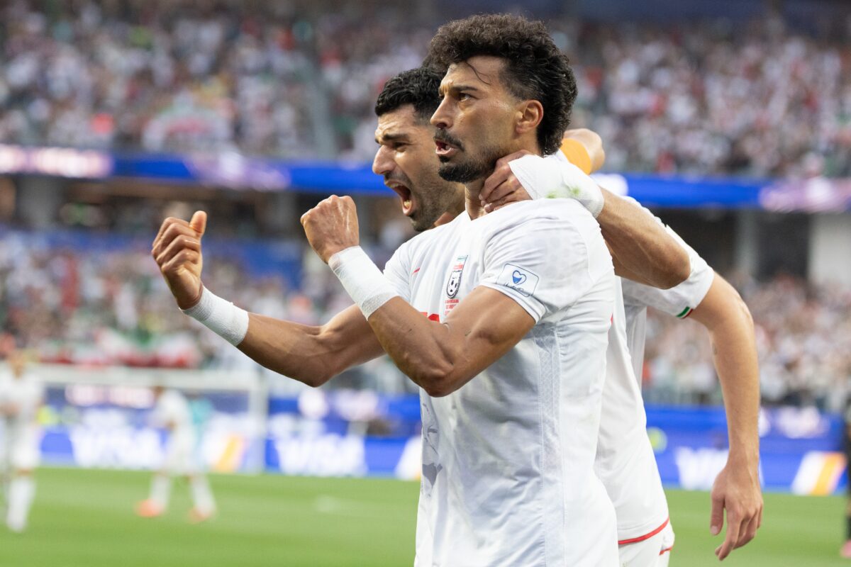 INGLEWOOD, CA - JUNE 15: Ramin Rezaeian #23 and Mehdi Taremi #9 of IR Iran celebrate a goal during the FIFA World Cup 2026 Group G match between IR Iran and New Zealand on June 15, 2026 at Los Angeles Stadium in Inglewood, CA. (Photo by Karl Anderson/Icon Sportswire) (Icon Sportswire via AP Images)