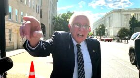 Bernie Sanders Bashes Trump When Protester Confronts Him Over Platner Outside Dem HQ