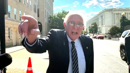 Bernie Sanders Bashes Trump When Protester Confronts Him Over Platner Outside Dem HQ
