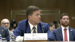 jay clayton looking surprised at his confirmation hearing