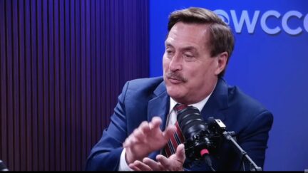 Mike Lindell in front of a microphone