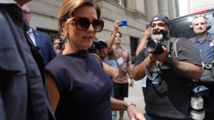 thompson's wife leaves court the day mangione pleads guilty