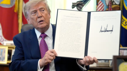 trump holds up executi