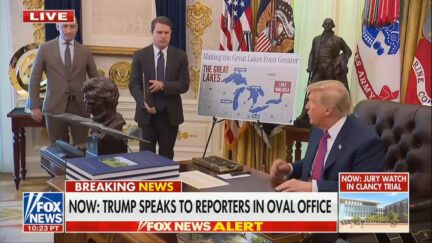 trump with maps of lake ontario