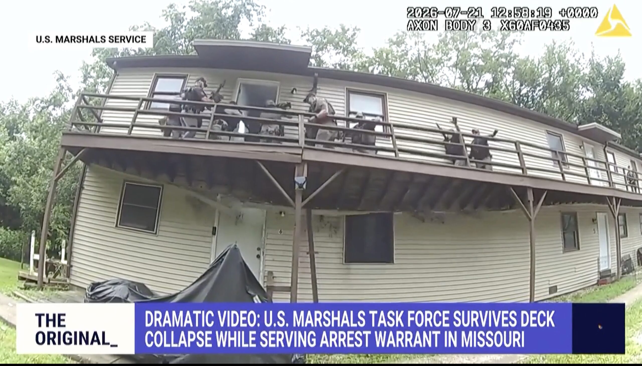 marshals on a second story exterior deck begin to fall as deck starts to collapse