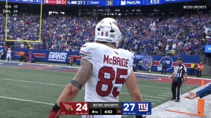 Trey McBride argues with NFL referee