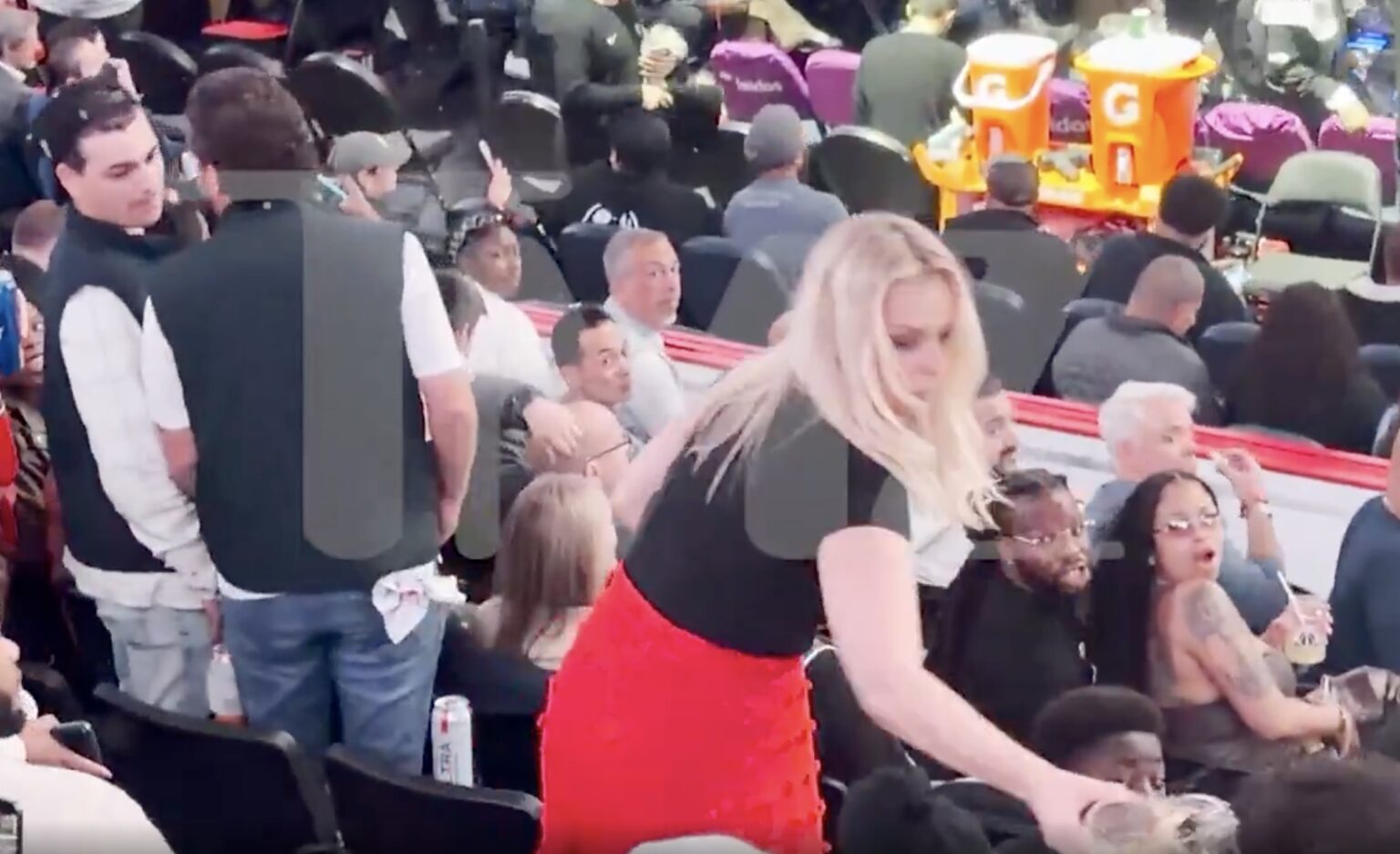 Britt McHenry Throws Drink at Fan After Angry Encounter